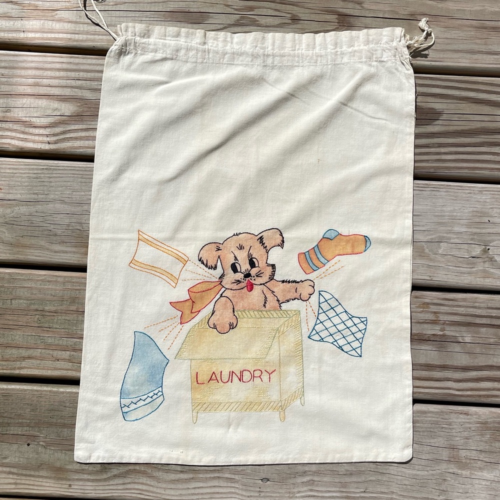 Decorate a plain laundry room with this vintage 1940’s laundry bag!